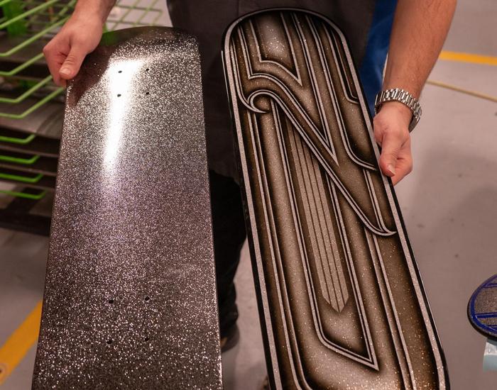 Students design and airbrush skateboards