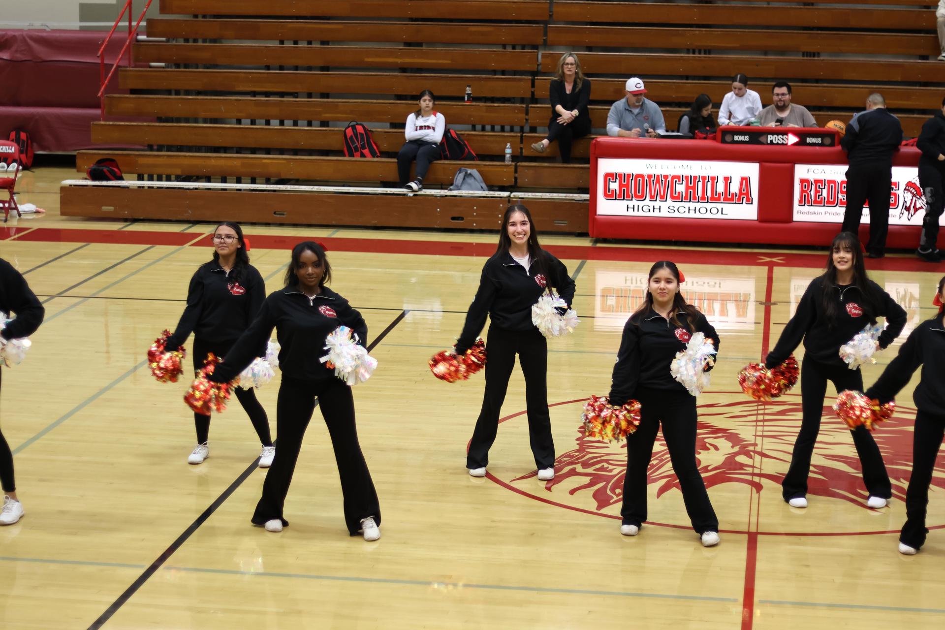 varsity cheerleaders in action