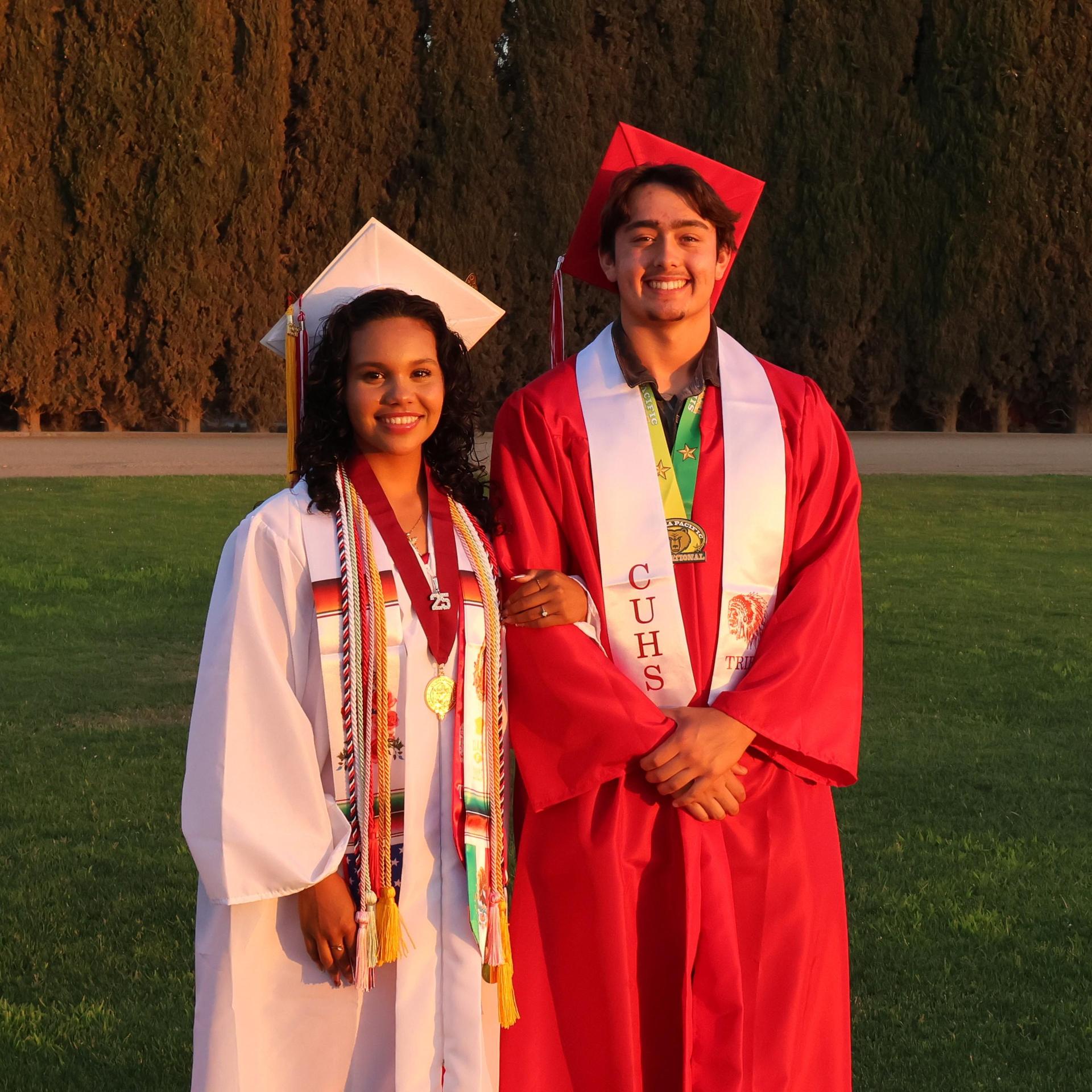 seniors posing together before walking in to graduation