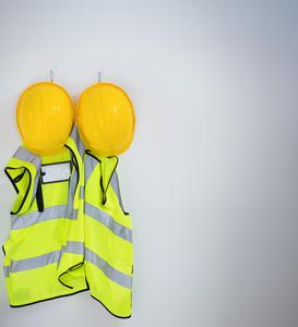 Protective workwear on wall hooks