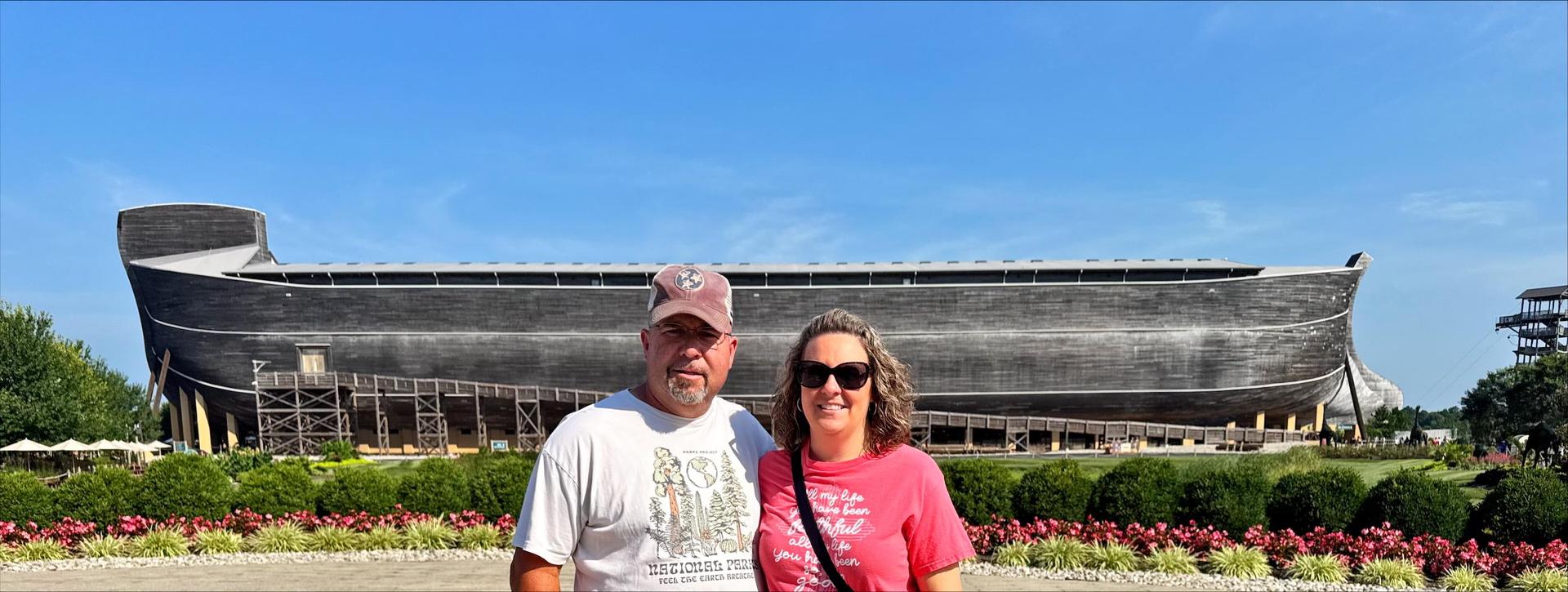 Man and woman in front of Ark. 
