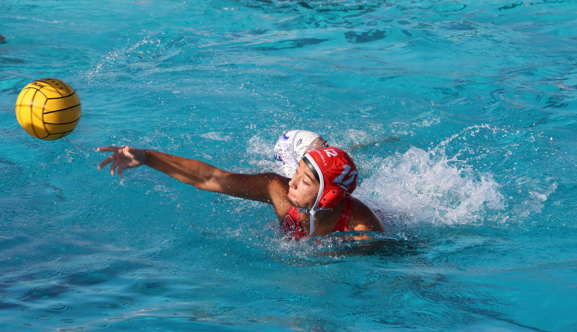 girls playing water polo against Sanger West