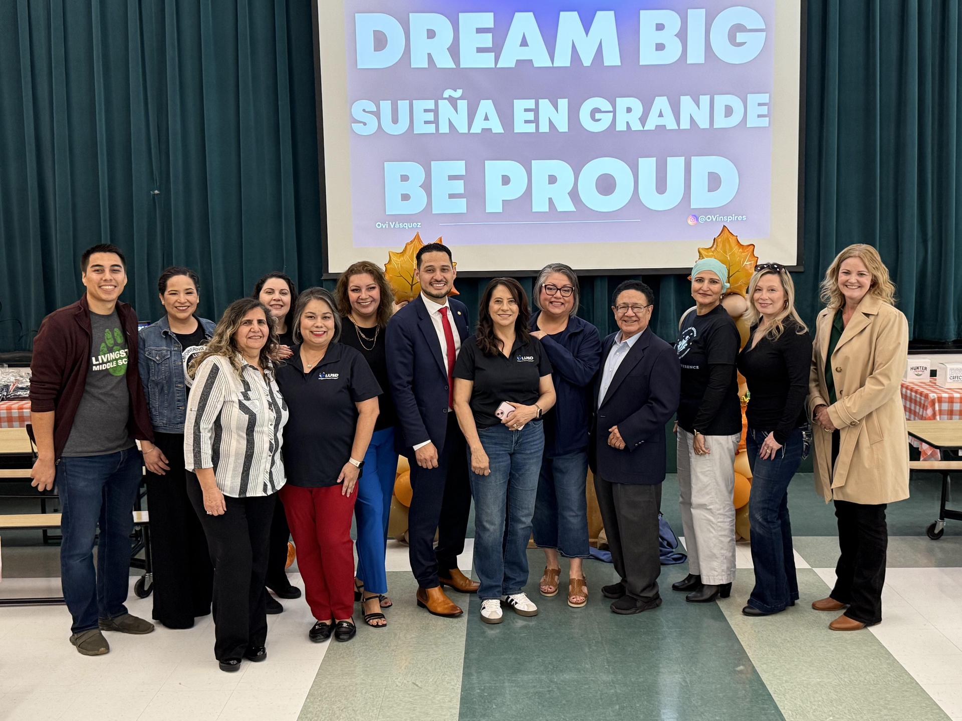 LUSD Staff posing with speaker