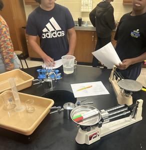 Close up photo of lab table with all the various items arranged on top