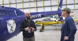 Aviation Maintenance Tech instructor Michael McIntyre talks with FAA official