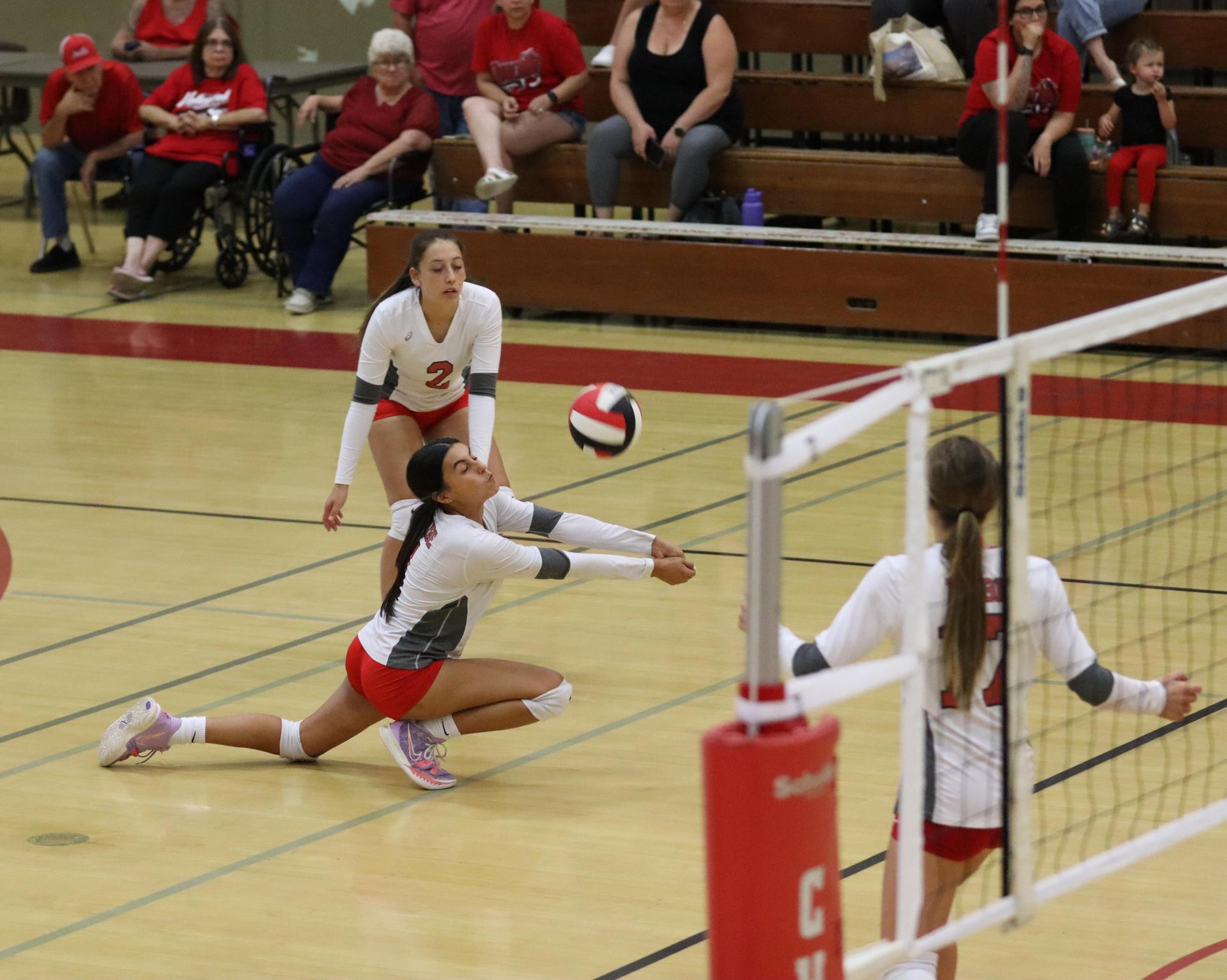 junior varsity girls playing volleyball against Liberty