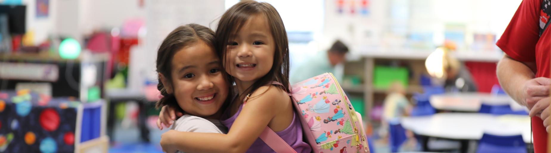 elementary sisters on back to school night