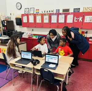 BHS Student sitting with Davis students