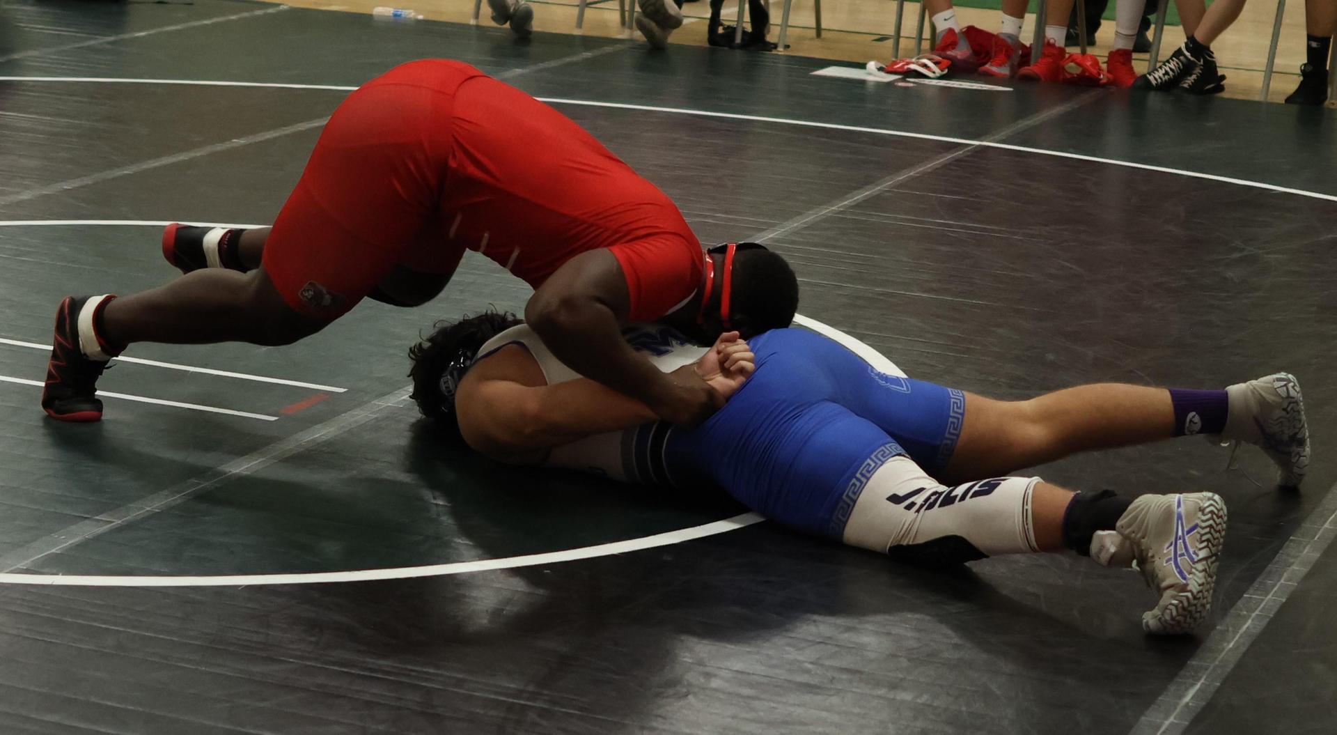 Boys wrestling in the Liberty Duals event 140