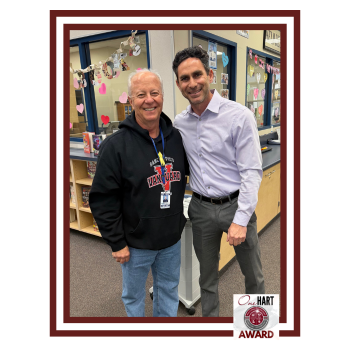 Two men posing for the camera