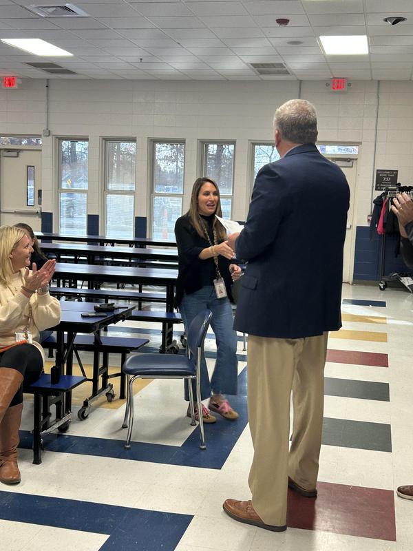 Rice Teachers Receive Checks from State Department