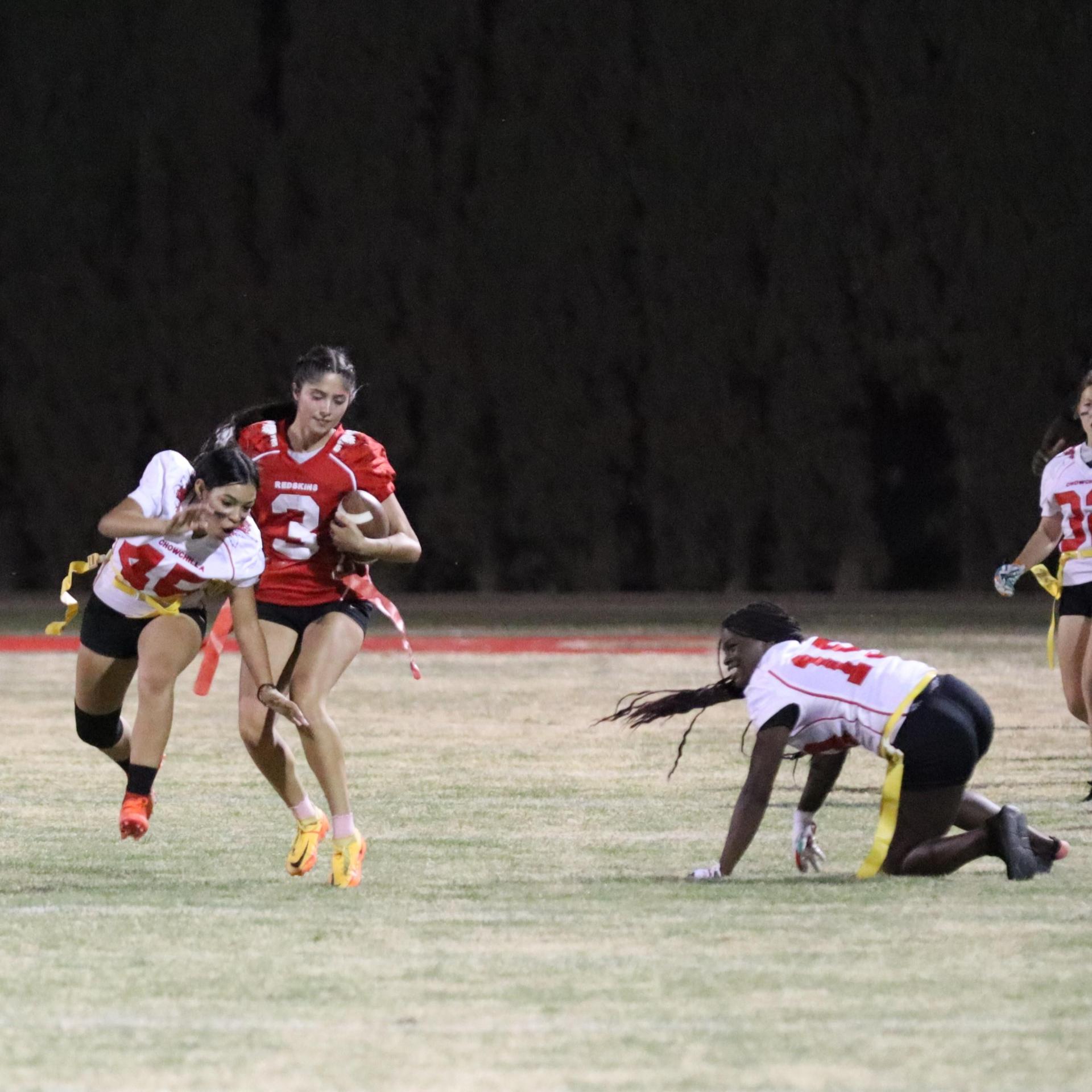 girls playing flag football