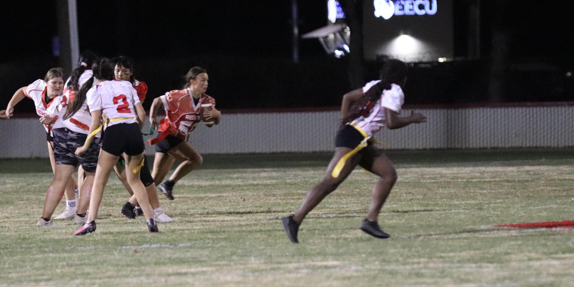 girls playing flag football