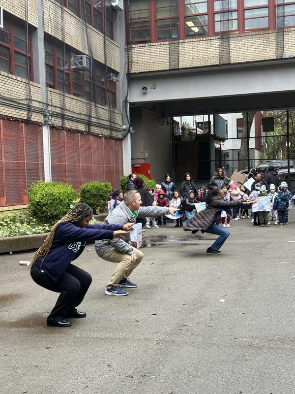 Stretching exercises led by physical education teacher