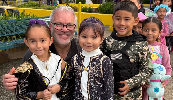 student at the LGE book parade with Superintendent Thorbahn