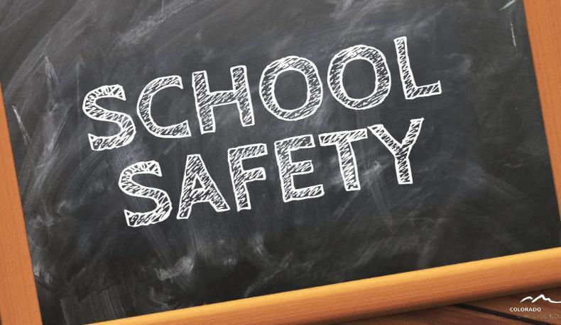 A chalkboard with the words "School Safety" on it