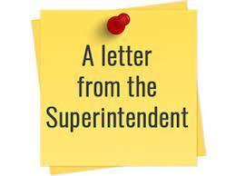 Yellow post it with words Letter from Superintendent