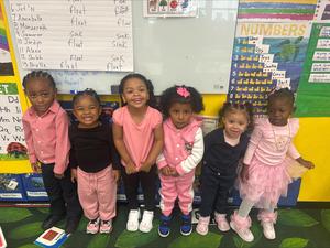 3K students wearing different shades of pink