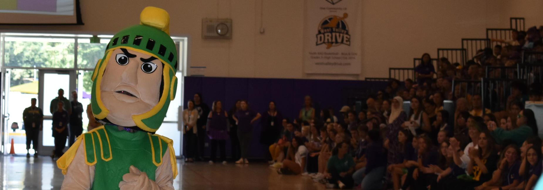 RJF mascot Troy attends a spirit rally.