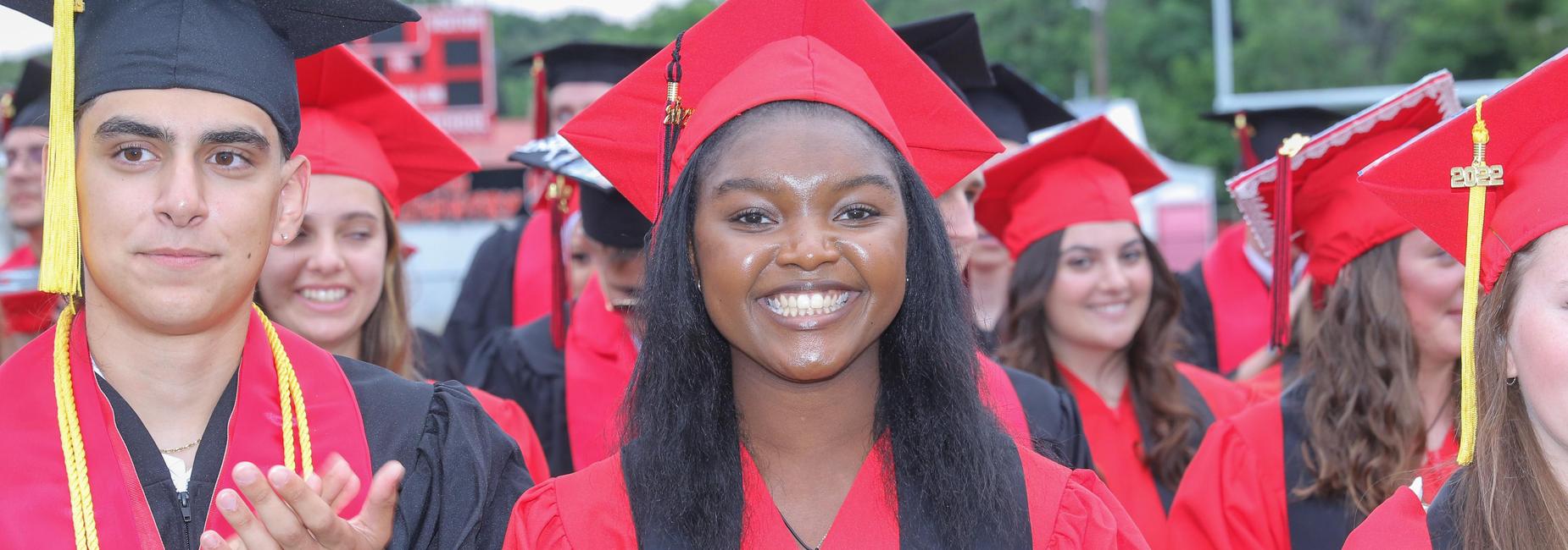 Graduates clapping