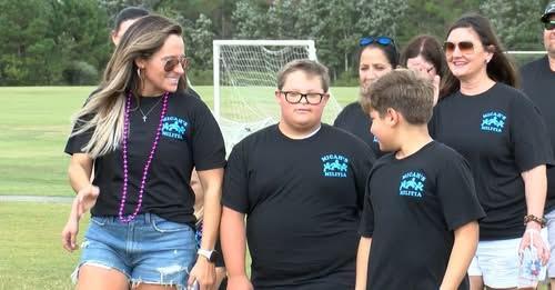 Micah is boldly leading and bringing awareness to the purpose of the Buddy Walk! We are proud of you!!