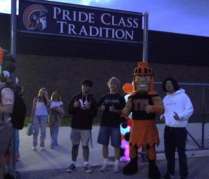 Tommy Trojan welcomes seniors to the senior sunrise.