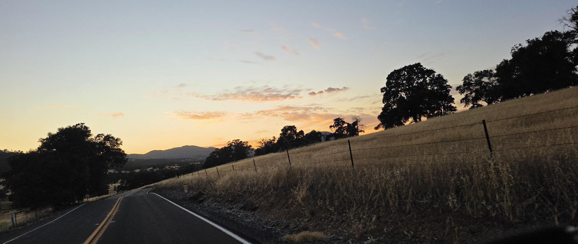 sunset while driving down the road