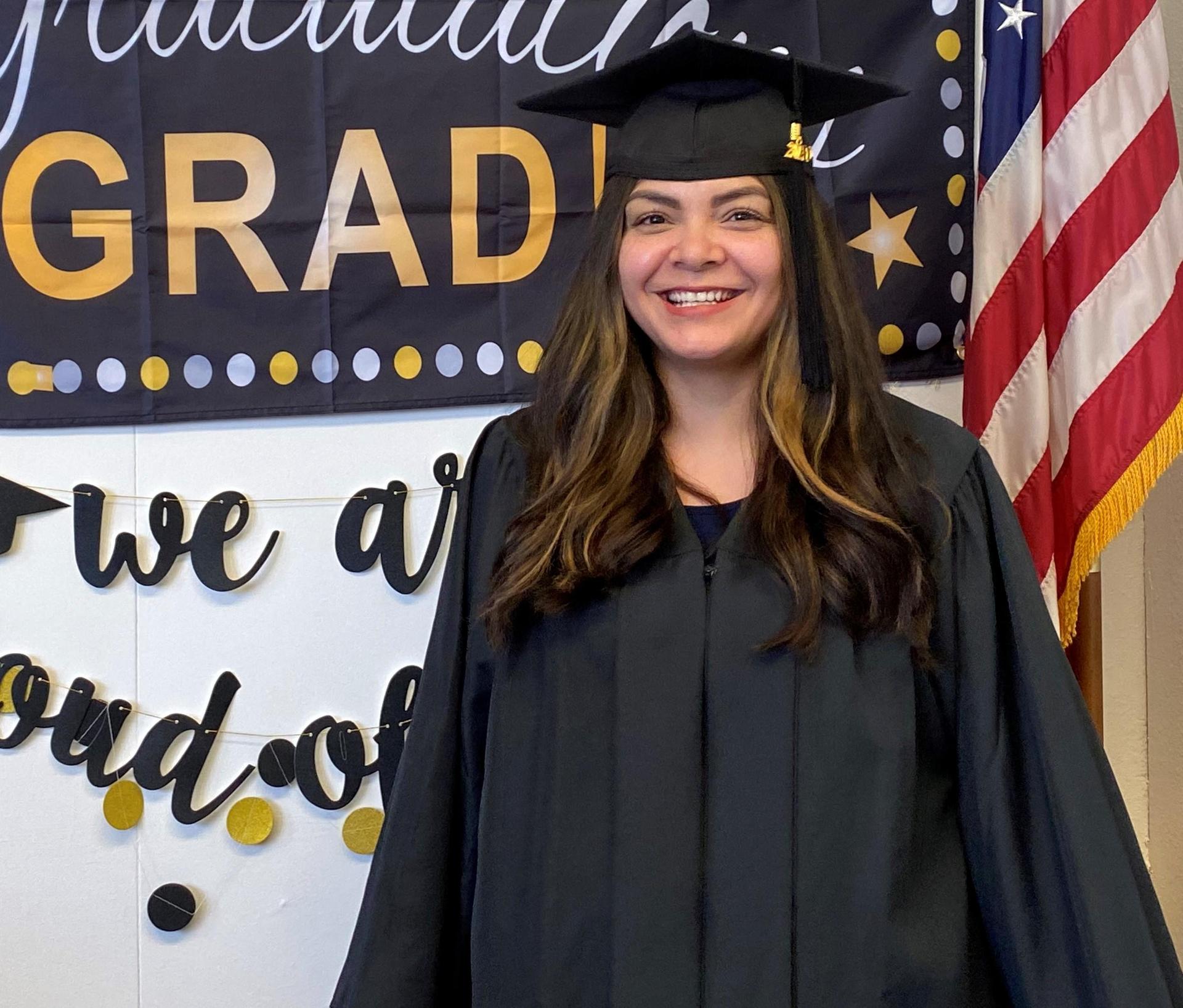 Woman in Grad cap and gown