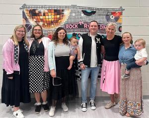 Teachers at a school dance.