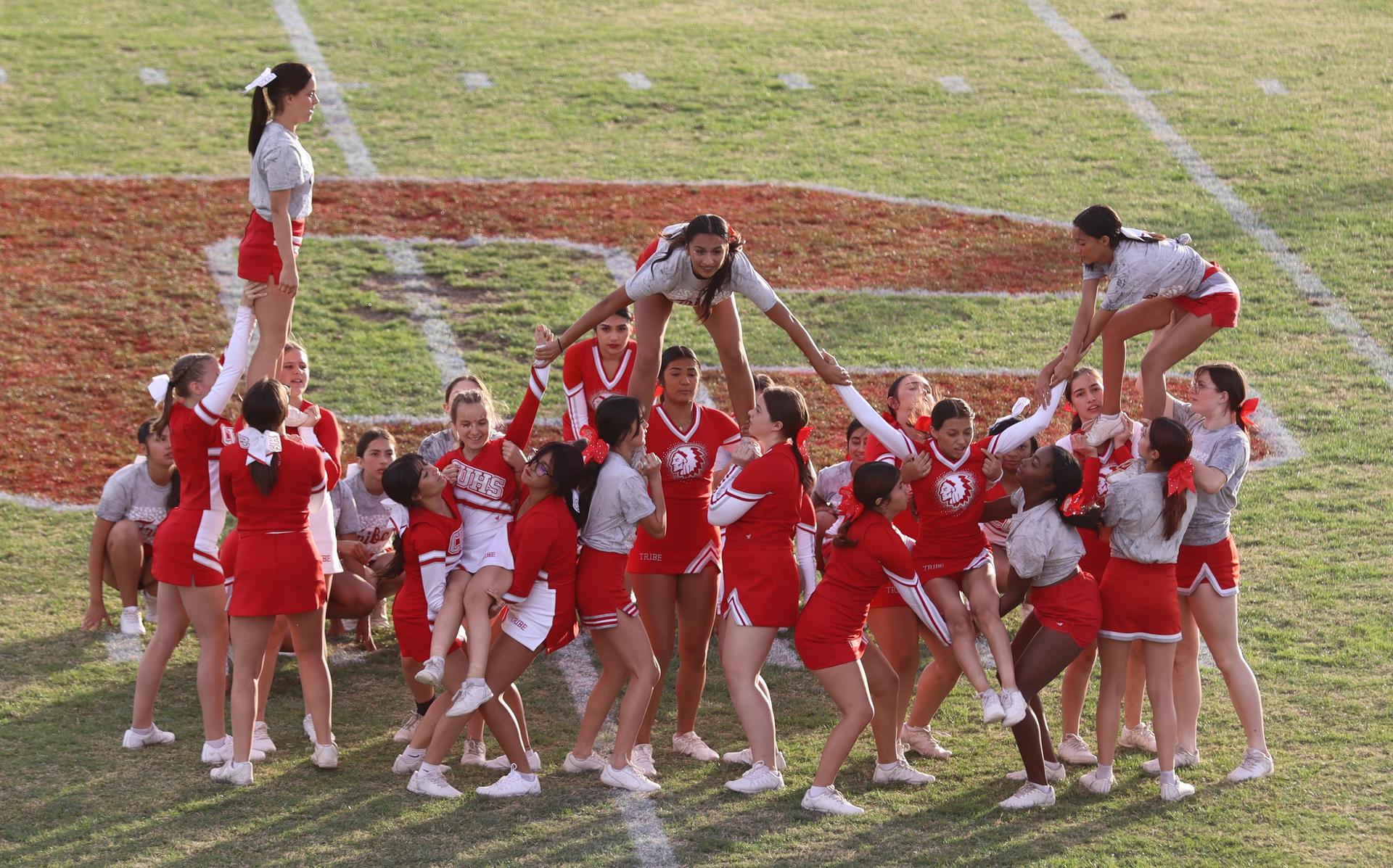 Combined cheer performing at halftime of the football game