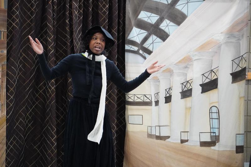 An actress from Bright Star Theatre portrays abolitionist Sojourner Truth.