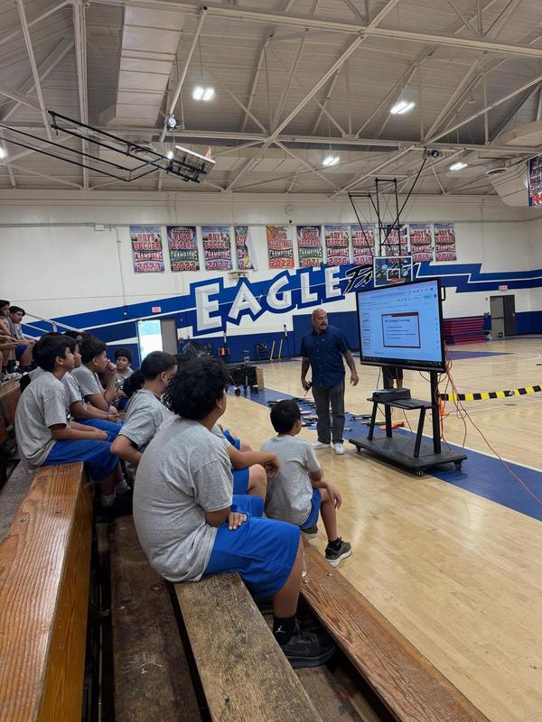 Mr. Martinez speaking to students