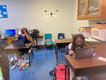 Students using their new Chromebook