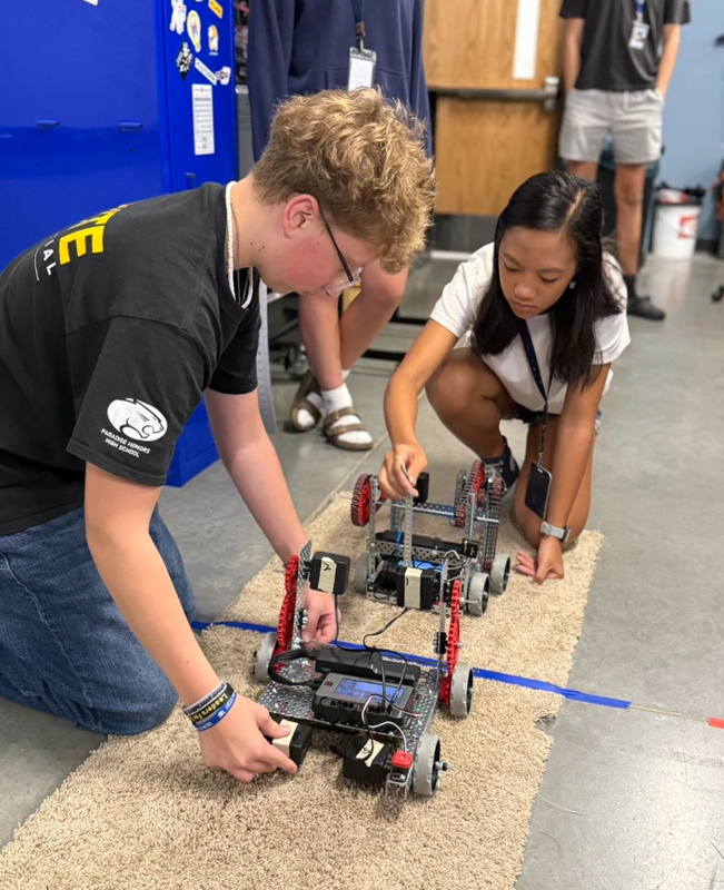 photos of students building a robot