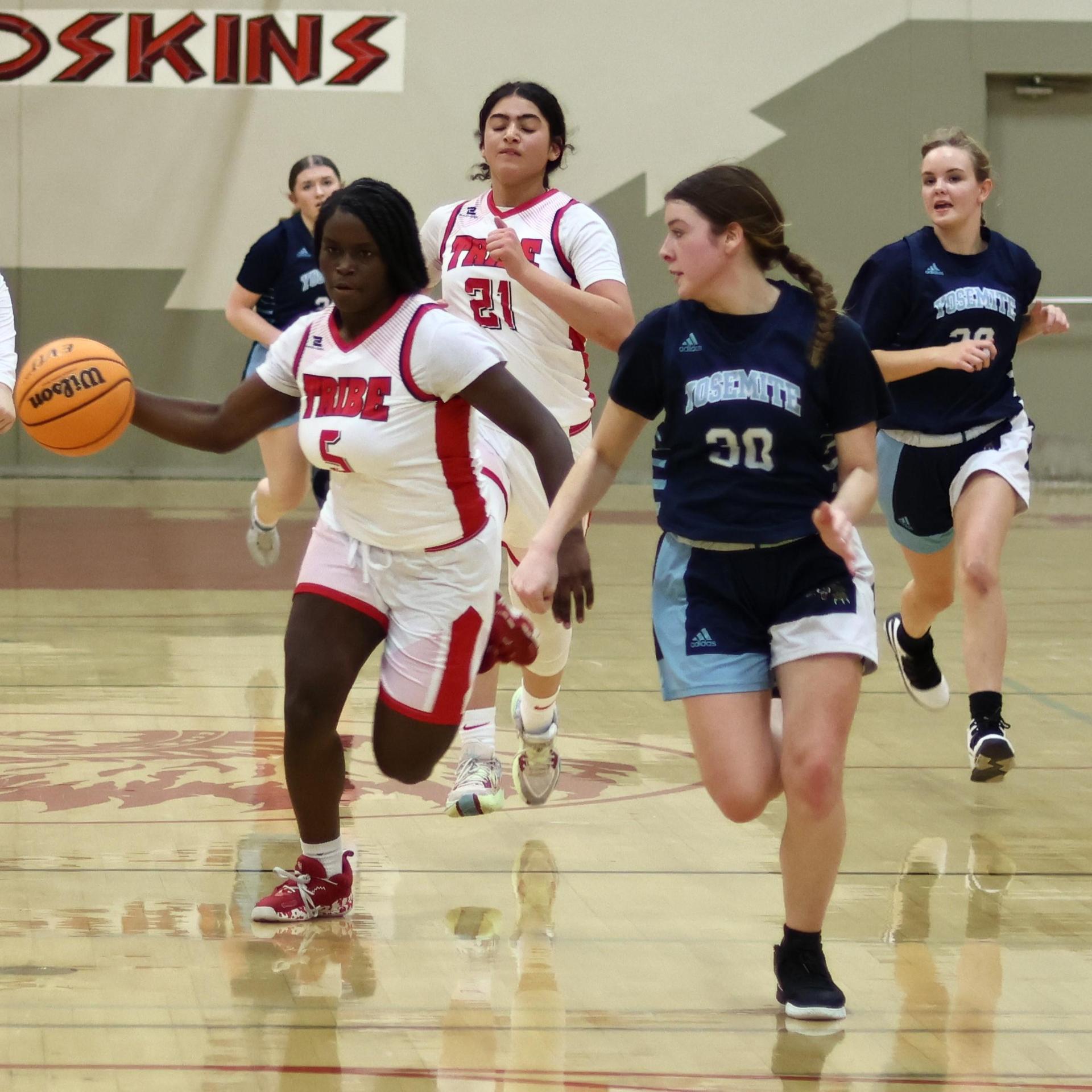 varsity girls playing against yosemite