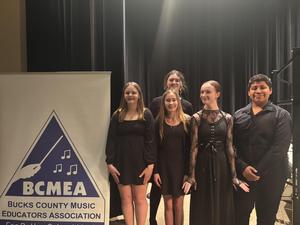 Image of 4 middle school chorus members