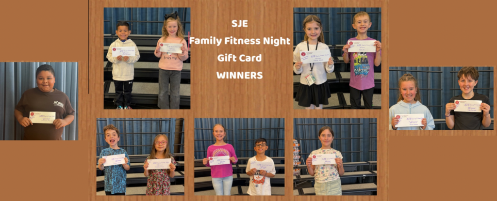 Children holding gift certificates at a family fitness event.