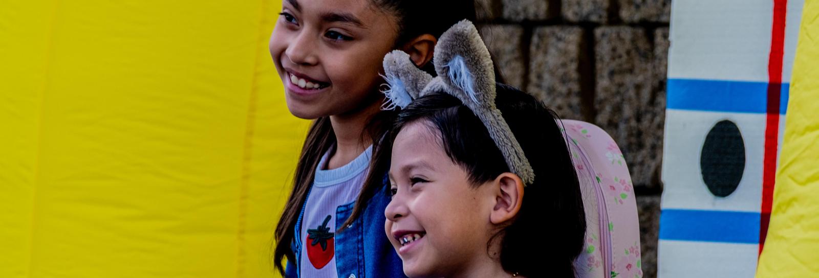 students smile at camera