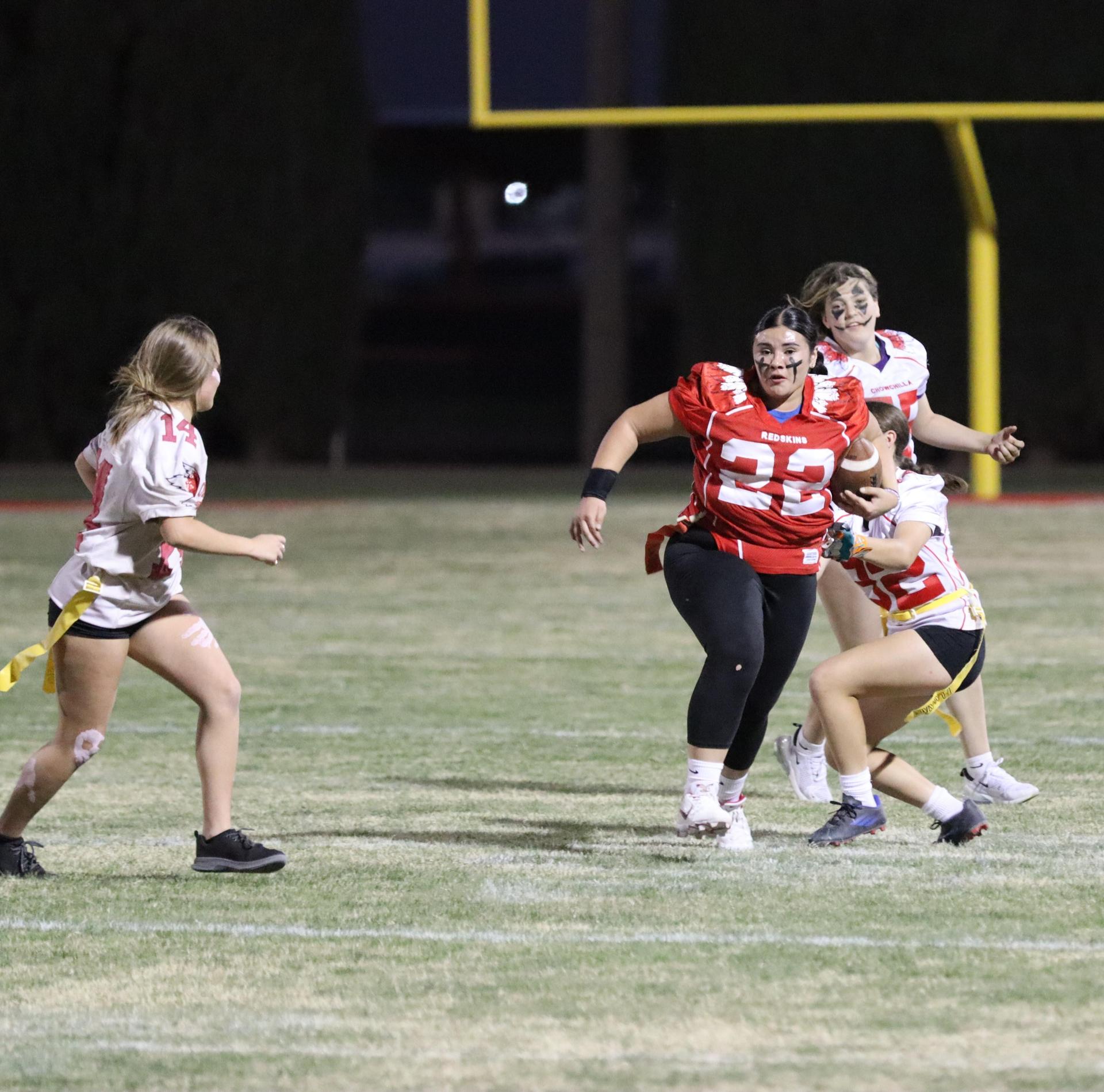 girls playing flag football