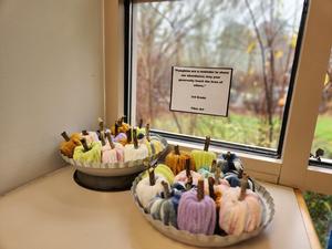 yarn pumpkins on display