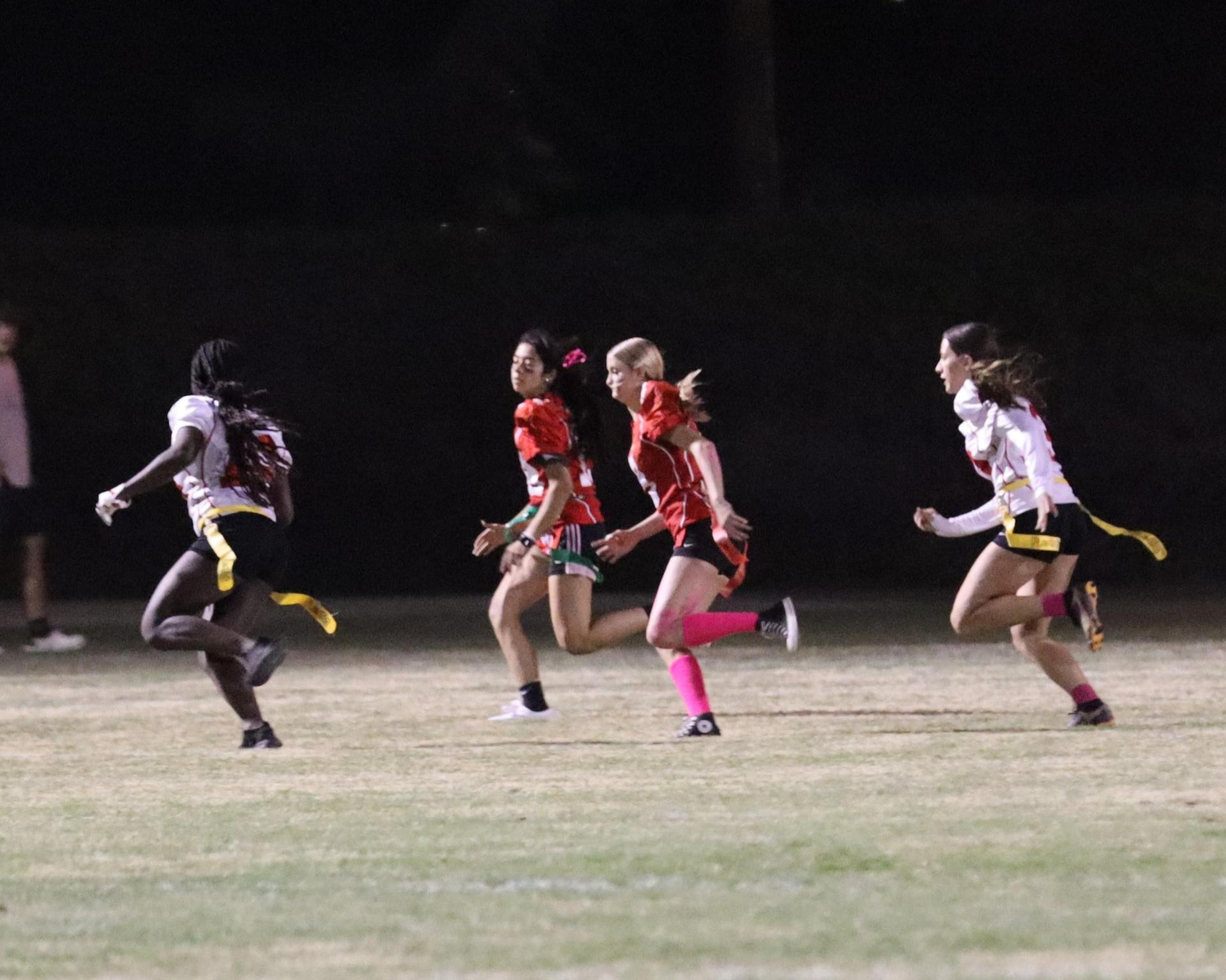 girls playing flag football