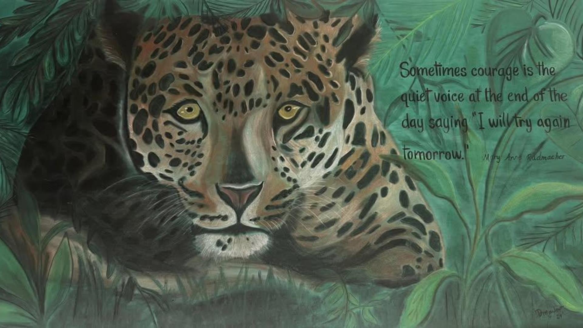 A painted leopard resting among green foliage with an inspiring quote beside it.