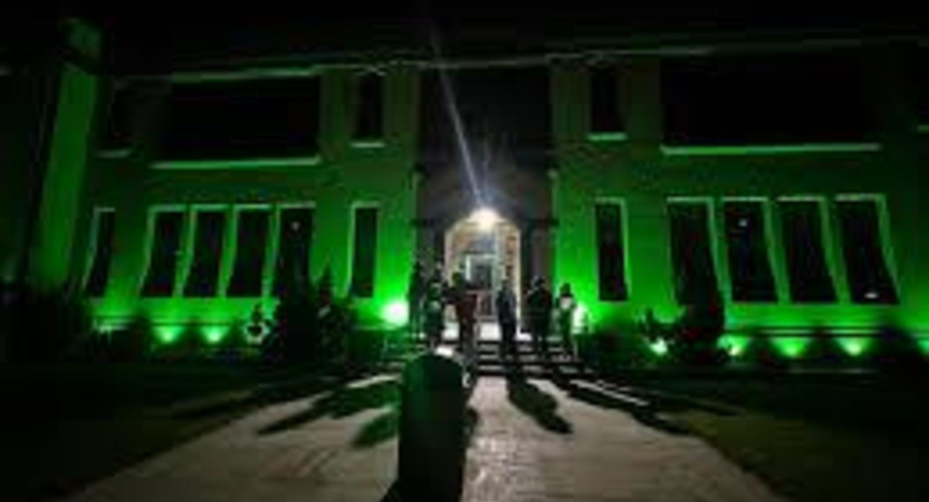 front of school with green light