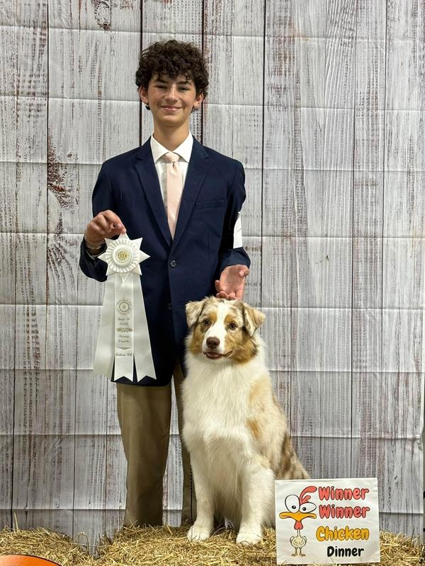 Sawyer Johnson with dog and ribbons