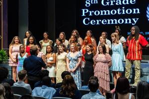 The choir performs at the promotion ceremony