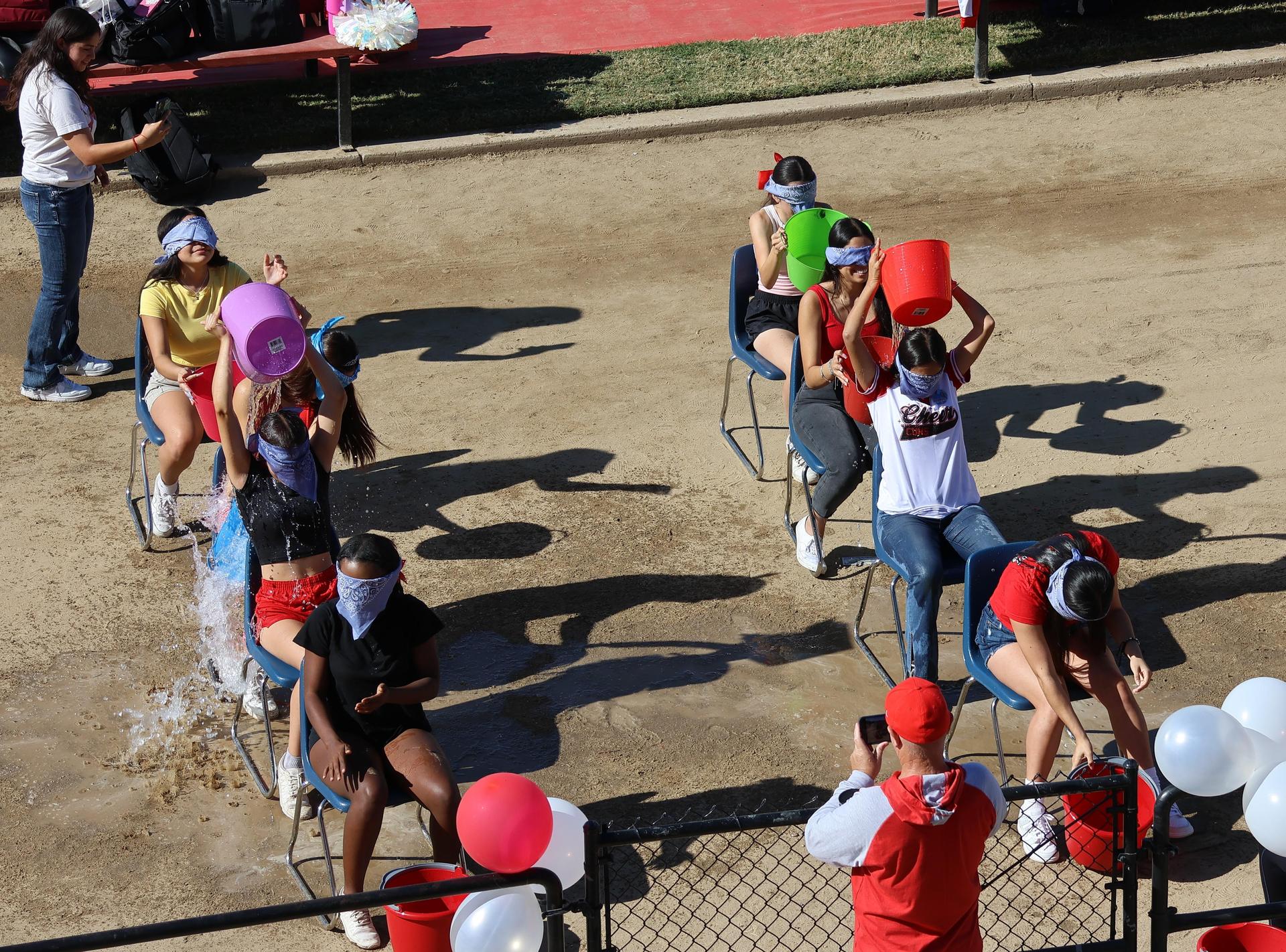 students and staff at the homecoming rally