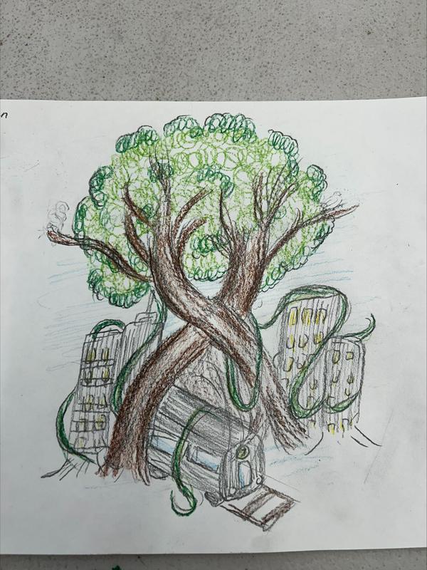 students drawing of a tree with a train going through the trunk
