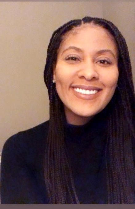 Informal photo of Amanda Hoover, smiling, face only, slightly off center