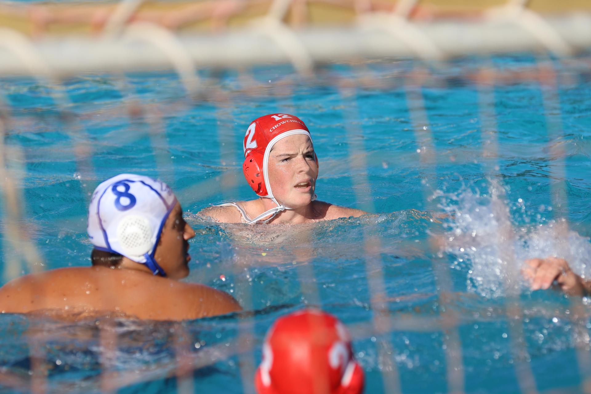 boys playing water polo against Madera