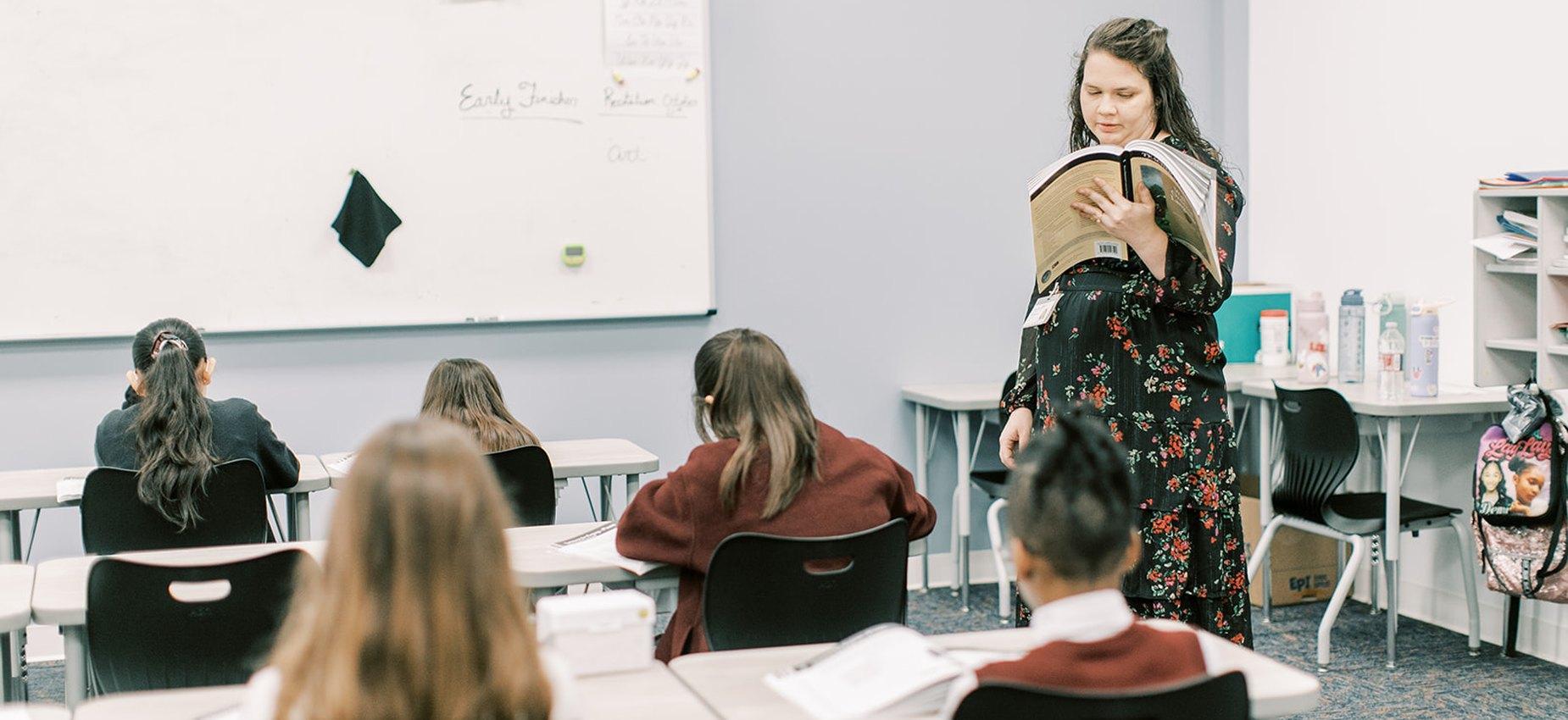 Teacher reading aloud to her class at Founders Classical Academy of Fort Worth